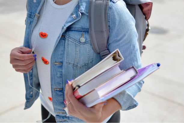 student carrying books