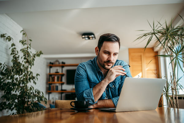 Man looking at laptop